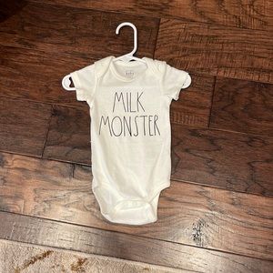 Brand new never worn Rae Dunn onesies. 6-9 months